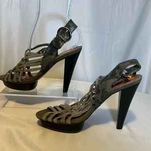 Olive 5" faux side and snakeskin heels with platform. never worn.